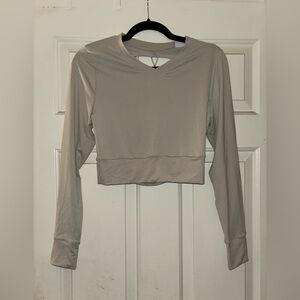 Tan, cropped Gymshark workout top